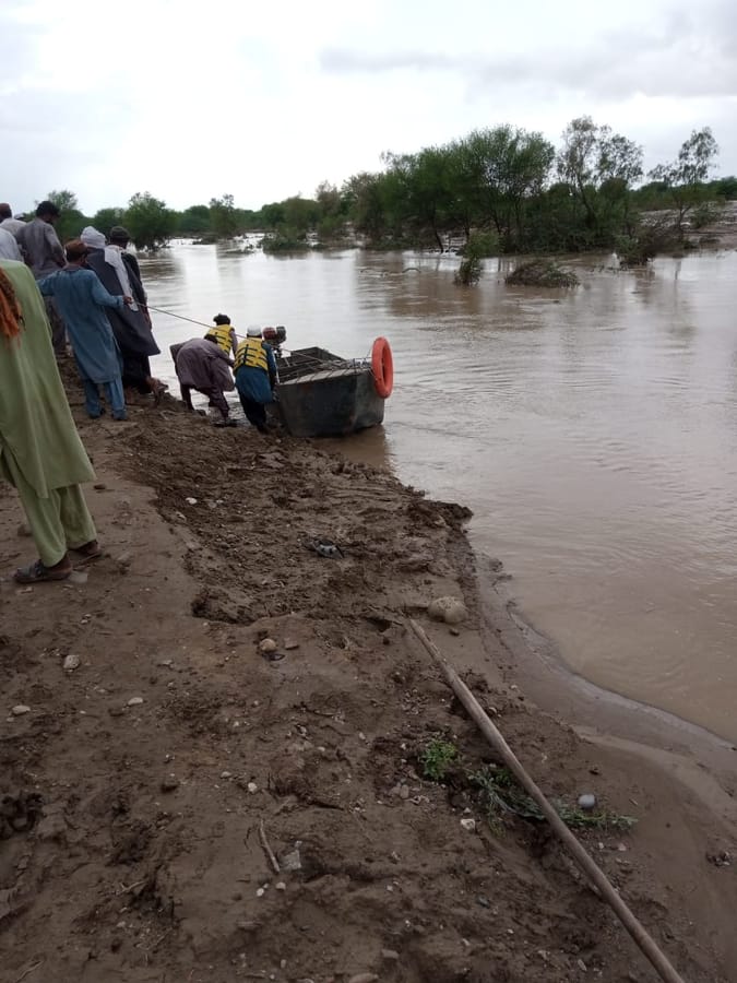 Floodwater cutting off access to a settlement.